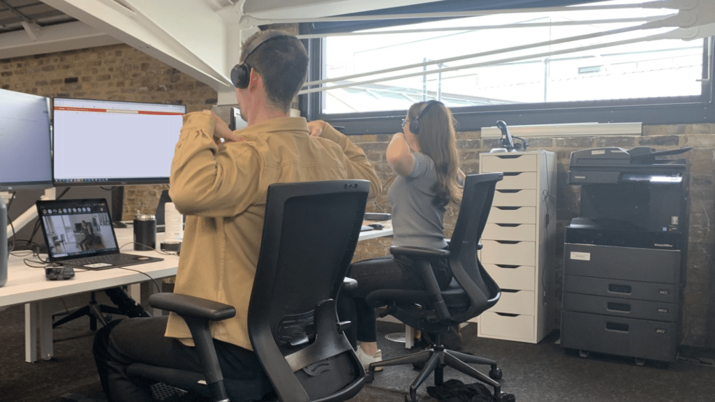 Corporate desk yoga session
